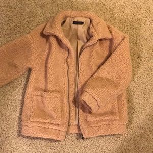 Light brown poopy/fluffy jacket.